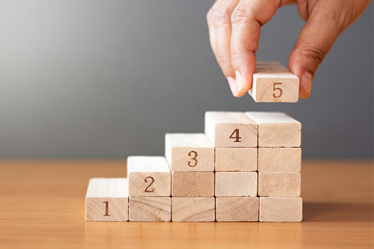 Hand-Building-Wooden-Blocks-Stack-Growth-Progress-Achievement_News